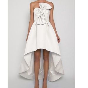 Alexia Maria twisted bow high low dress